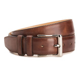 Meermin cognac Museum Calf belt coiled to show buckle close-up, nickel-plated solid brass hardware and stitched keeper loop