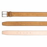 Meermin gold suede belt, buckle end, strap, and vegetable-tanned leather lining shown stacked to reveal full construction