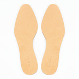 Pair of Meermin full grain calf insoles, top view showing smooth beige leather surface and shaped contours