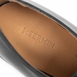 Close-up of Meermin full grain calf insole showing the beige leather texture and embossed logo detail